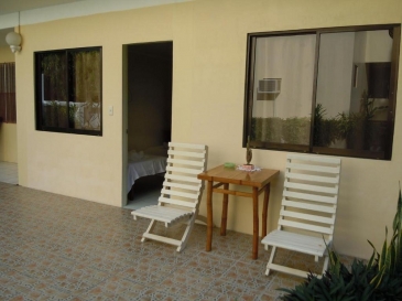 wellbeach dive resort_deluxe double room with garden view balcony