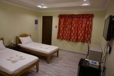 wellbeach dive resort dauin_super deluxe twin room